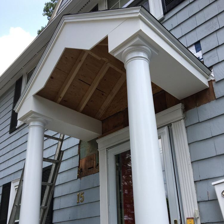 New portico columns and trim work